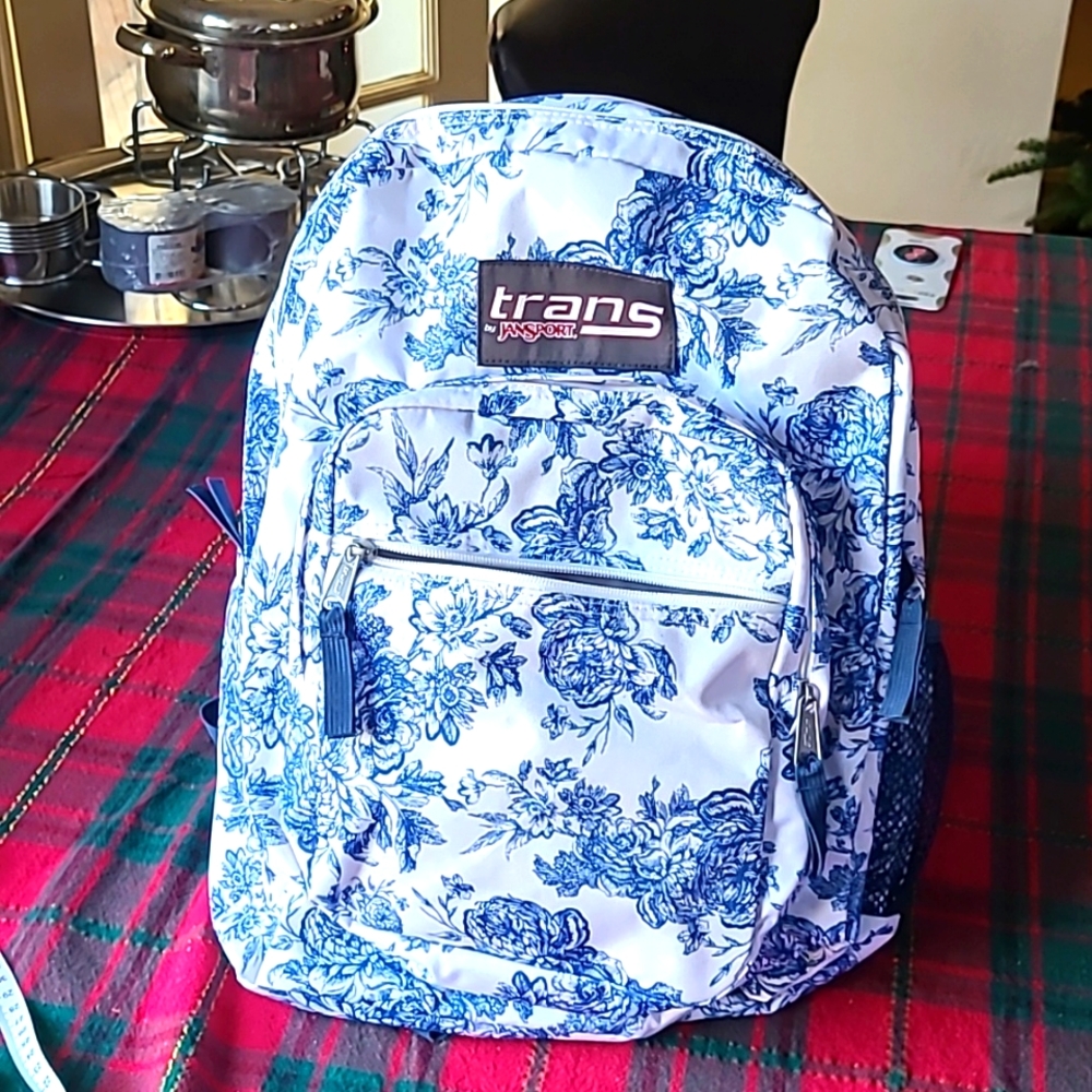 Jansport Trans backpack blue floral white, new open box